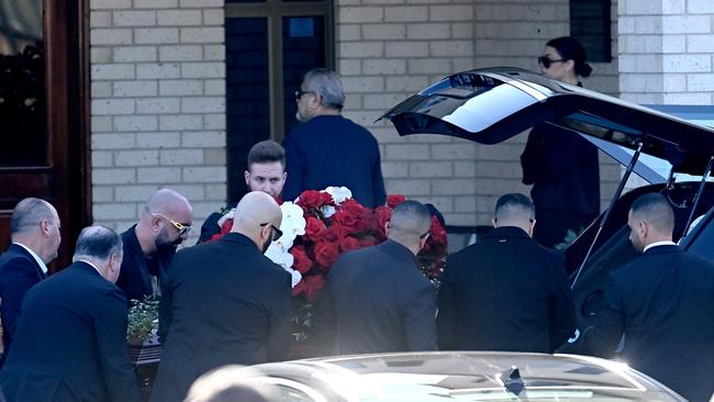 Alen Moradian’s casket is taken into the Greenfield Park church on Wednesday.