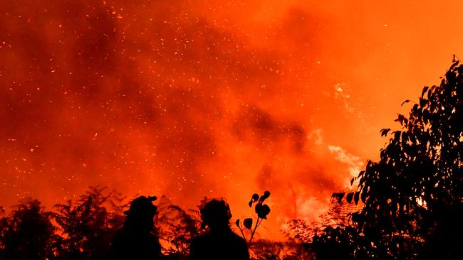 Horrifying scenes in the middle of a ember storm on the Sunshine Coast on Monday night. Photo: John McCutcheon