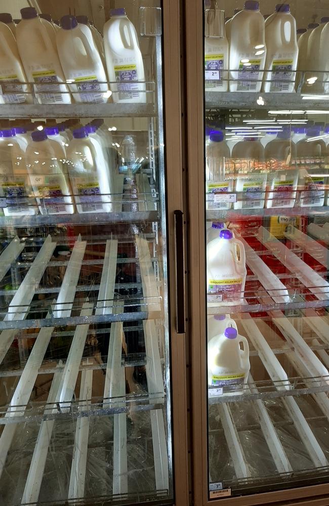 Shelves have been stripped at Woolworths Caboolture South. Photo: Erin Smith