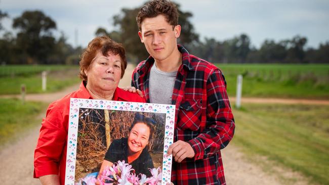 Alicia Little’s mother Lee and eldest child Ariki, 21, with a picture of the slain mum of four. Picture: Mark Stewart