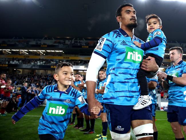 Jerome Kaino runs out onto the field with his children. Pic: Getty