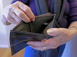 A man holds an open wallet, empty of money. Picture: Warwick Daily News