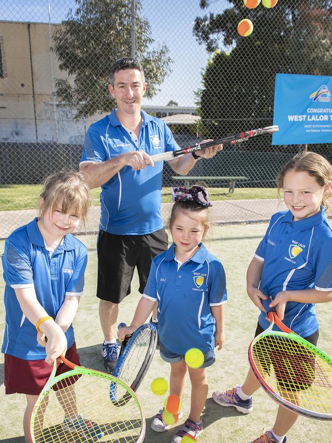 Lalor West Tennis Club has just been named club of the year by Tennis Victoria. Club president Andrew MacNeill with kids L-R Sienna (6), Emily (6) and Hannah (9). Picture: Ellen Smith