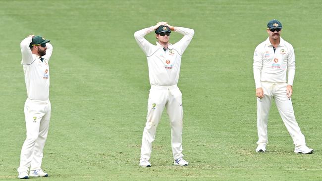 Matthew Wade, Steve Smith and David Warner look on as their Border-Gavaskar series hopes slipped away. Picture: Getty