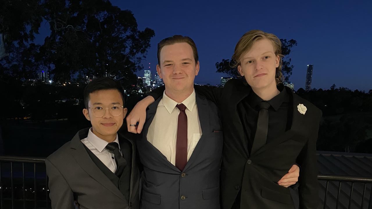 Vincent Lee, Harry Treglown and Francis Eades catching up at the Southern Cross Catholic Formal Photo: Majella Thompson