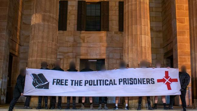Members of the SA Men's Health Club – a front for the National Socialist Network – pose on the steps of the Adelaide Magistrates Court ahead of their alleged leader Cameron Brodie-Hall's bail application. Source: Supplied