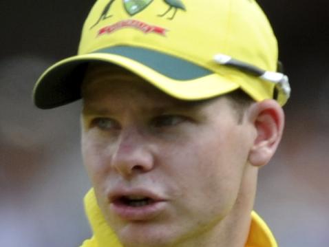 Australia’s Steve Smith leads his team in at the end of the New Zealand innings with a chase of 247 in the third and deciding one-day international cricket match at Seddon Park in Hamilton, New Zealand, Monday, Feb. 8, 2016. (Ross Setford/SNPA via AP) NEW ZEALAND OUT