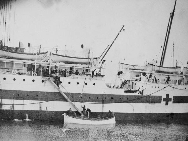 *** COPYRIGHT Australian War Memorial *** At sea off Gallipoli, wounded being transferred from the ship Galeka to the Hopital Ship Gascon, half an hour after the first boat left for the shore. The wounded are climbing a ladder to the deck from a ship's boat. (Pic Disk 1 AWM, donor M. Carter). world war one first historical /World/War/1914/1918 Picture: Supplied