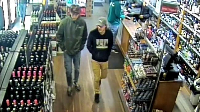 This screen grab from CCTV shows Theo Hayez, right, in a bottle shop in Byron Bay on Friday, May 31. Picture: NSW Police/AFP