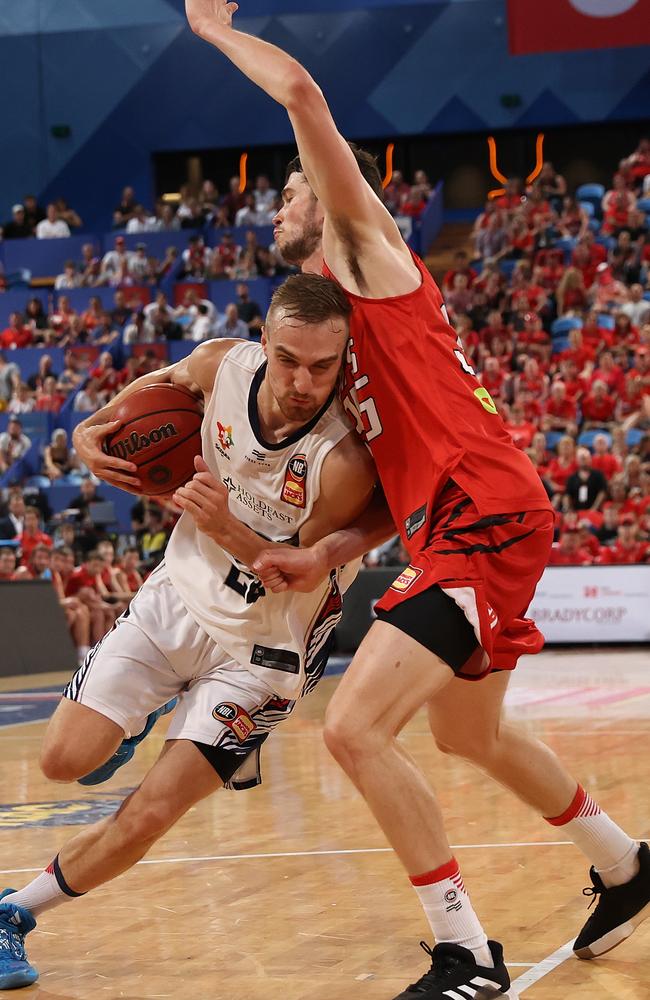 Anthony Drmic drives around Clint Steindl. Picture: Paul Kane (Getty).