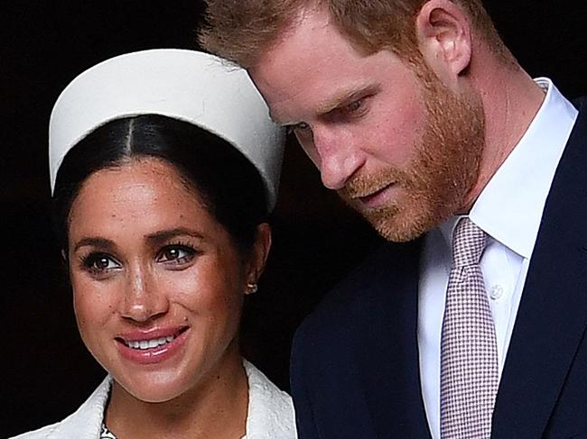 (FILES) In this file photo taken on March 11, 2019 Britain's Prince Harry, Duke of Sussex (R) and Meghan, Duchess of Sussex leave after attending a Commonwealth Day Service at Westminster Abbey in central London. - Prince Harry will produce a documentary about the Invictus Games for disabled military veterans -- the first series under a lucrative deal he and  wife Meghan Markle signed with Netflix after moving to California last year.  Harry, who served with the British military in Afghanistan, will appear on camera and executive-produce "Heart of Invictus," a multi-episode series which follows competitors as they train for next spring's competition in The Hague. (Photo by Ben STANSALL / AFP)