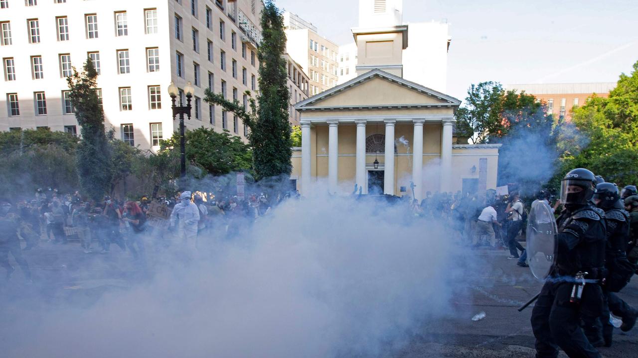 Police used tear gas to disperse protesters and priests prior to President Trump’s arrival despite claims all protesters were acting peacefully. Picture: Jose Luis Magana / AFP.