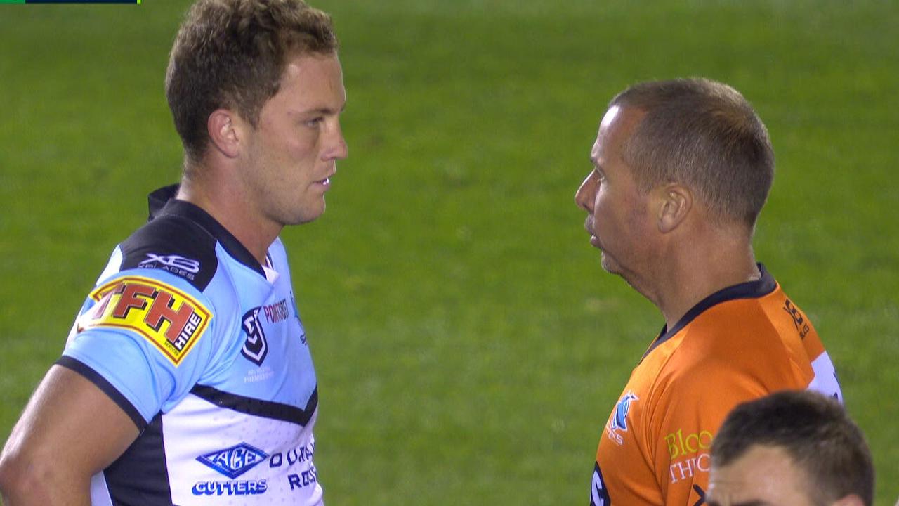 Matt Moylan is assessed by a trainer after the knock to his head.