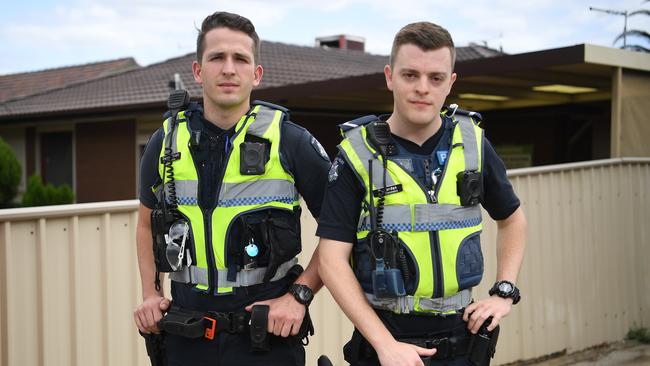 Constable Darcy Elliott and First Constable Grant Jordan outside the scene of a rescue in Jacana. Picture: Julian Smith