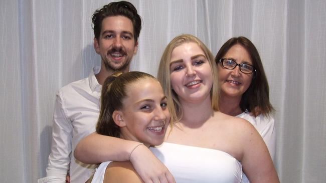 Elizabeth Annette Dinjar with her three children. Her family believes Johnson and Johnson's Baby powder potentially caused her 2018 cancer death. Picture: supplied