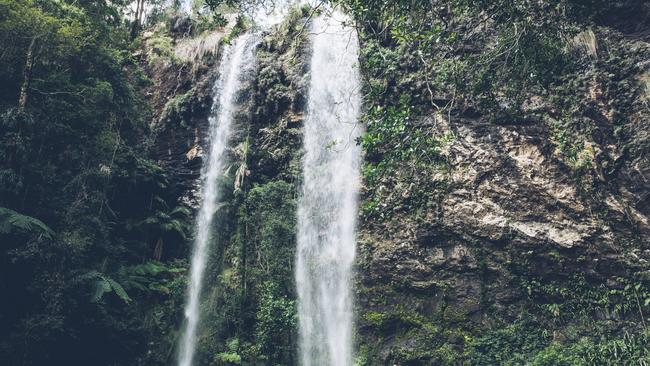 Hiking under Twin Falls. Picture: Tourism and Events Queensland