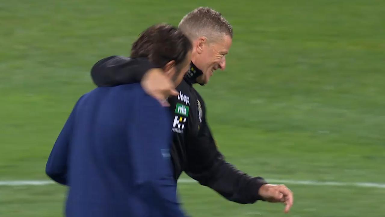 Damien Hardwick and Chris Scott before the first bounce.