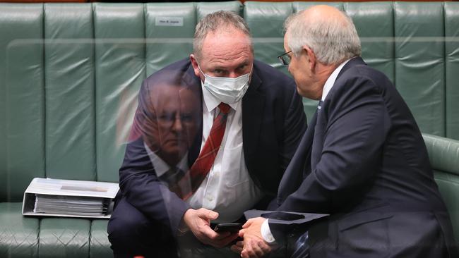 Scott Morrison and Barnaby Joyce confer during Question Time. Picture: NCA NewsWire/Gary Ramage