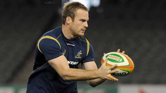 (FILES) A file photo taken on June 13, 2014, shows Australian Wallbies player Pat McCabe attending the captains run in the lead up to the second test between the Australian Wallabies and France in Melbourne. Wallaby back Pat McCabe has retired from rugby after fracturing his neck for a third time, his ACT Brumbies coach Stephen Larkham said on August 27, 2014. AFP PHOTO / FILES / Mal FAIRCLOUGH IMAGE STRICTLY RESTRICTED TO EDITORIAL USE - STRICTLY NO COMMERCIAL USE