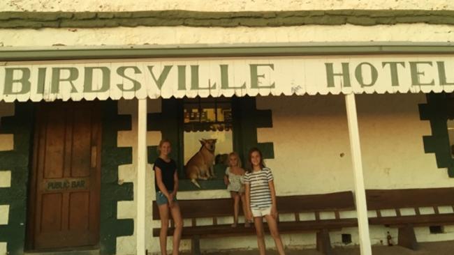 Chloe, Lottie and Phoebe Nikakis at Birdsville Hotel during the family's around Australia trip.