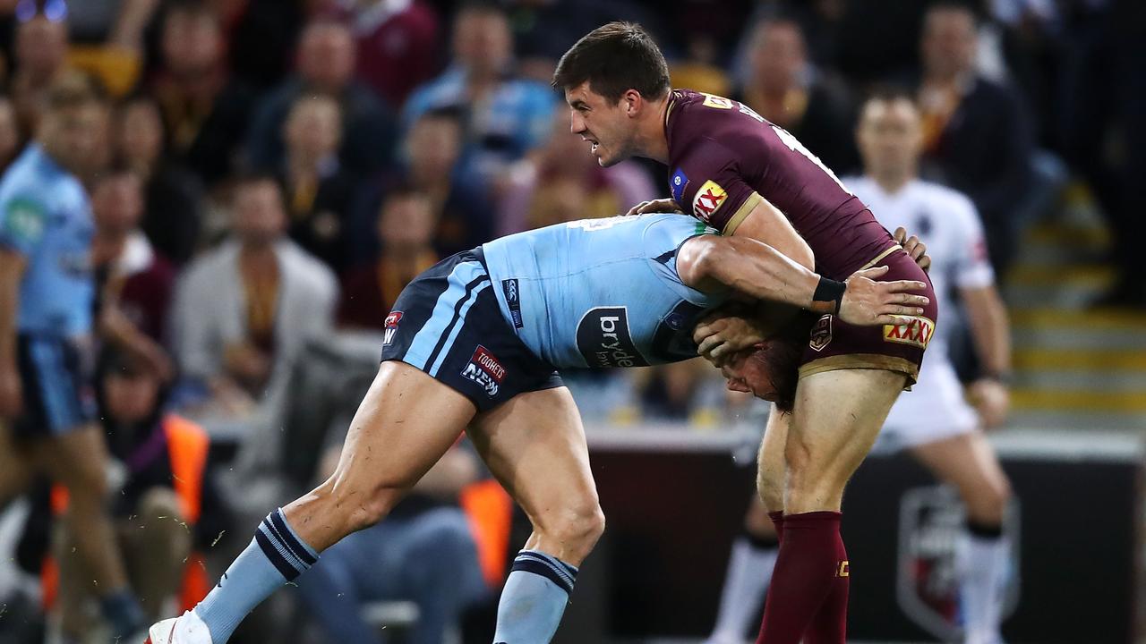 The moment: Tariq Sims tackles Ben Hunt off the ball, giving away a penalty that would lead to a Queensland try.