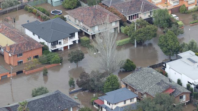 The trio targeted flood-hit Maribyrnong homes. Picture: David Caird