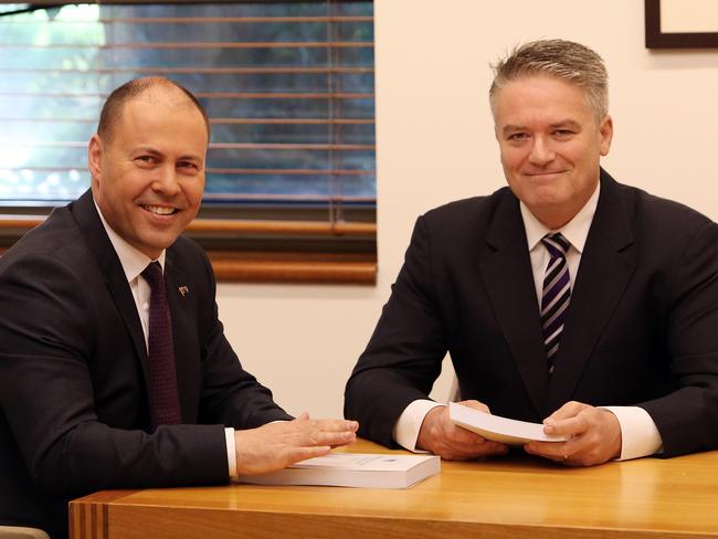 Treasurer Josh Frydenberg and Finance Minister Mathias Cormann in the Treasurers office before the release of the mid-year economic and fiscal outlook (MYEFO) at Parliament House in Canberra. Picture Kym Smith