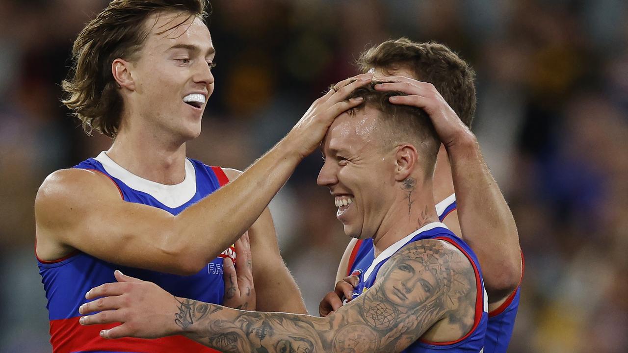 All 17 Bulldogs players on the field celebrated with Melbourne recruit James Harmes after he kicked his first goal for the club during the 91-point win over Richmond. Picture: Michael Klein