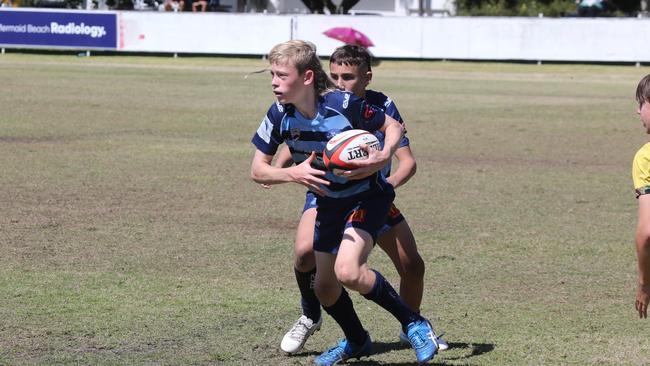 Action galleries of the junior rugby union grand finals, match played at Surfers Paradise Home Ground. Helensvale Hogs Vs Surfers Paradise Dolphins under 13s division. Hogs player Nate Te Whitu. Picture Mike Batterham