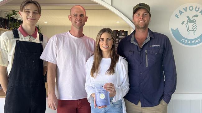 Kyle Myers and Matt Haimes opened Favours Coffee Shop in mid-2022. They are pictured with Belinda Holzhauser and a Pete Mackenzie.