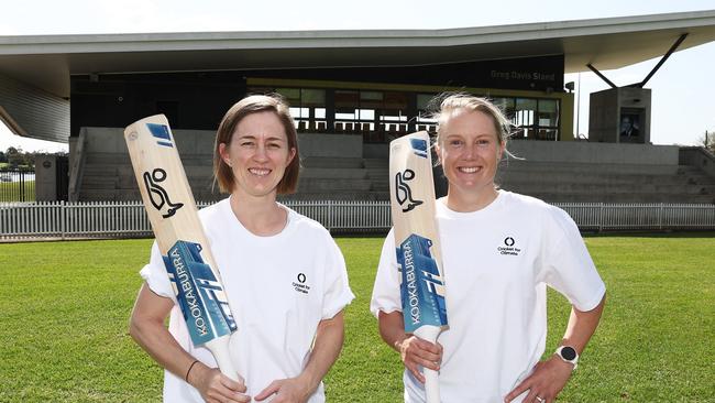 Rachael Haynes and Alyssa Healy launch the installation of 40kW of solar and two 13.5kW batteries at Drummoyne Oval. Picture: Matt King/Getty Images