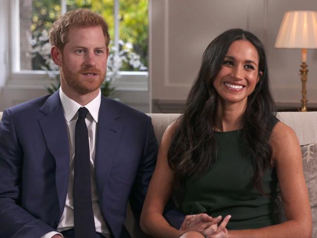 Prince Harry and Meghan Markle talk about their engagement during an interview in London. Picture: Pool via AP