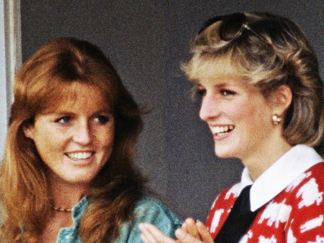 ONE TIME WEB USE ONLY - FEE APPLIES FOR REUSE -  Diana, Princess of Wales  (1961 - 1997) and her friend Sarah Ferguson attend a polo match at Smith's Lawn, Guards Polo Club, Windsor, June 1983. Diana is wearing a Muir and Osborne 'black sheep' sweater. (Photo by Princess Diana Archive/Getty Images)