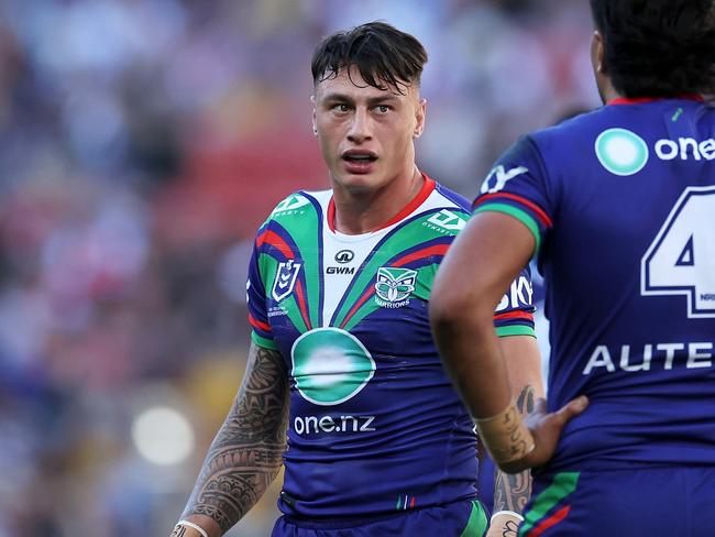 BRISBANE, AUSTRALIA - MAY 19: Charnze Nicoll-Klokstad and Adam Pompey of the Warriors speak during the round 11 NRL match between New Zealand Warriors and Penrith Panthers at Suncorp Stadium, on May 19, 2024, in Brisbane, Australia. (Photo by Hannah Peters/Getty Images)