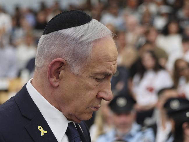Israeli Prime Minister Benjamin Netanyahu attends the annual ceremony at the eve of Israel's Remembrance Day for fallen soldiers (Yom HaZikaron) at the Yad LaBanim Memorial in Jerusalem, on Tuesday, April 29, 2025. (Abir Sultan/Pool Photo via AP)