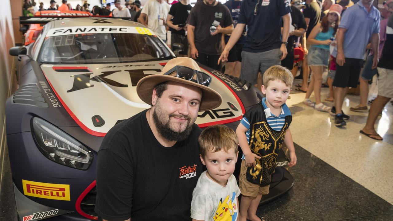 Josh Miller with sons Grayson and Jaxx (right) Miller as V8 Supercars team Red Bull Ampol Racing launch 2024 livery at Toowoomba Wellcamp Airport, Saturday, February 3, 2024. Picture: Kevin Farmer