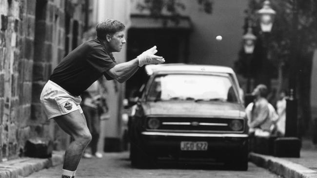 Ian Healy catches a golf ball in his inners in 1991