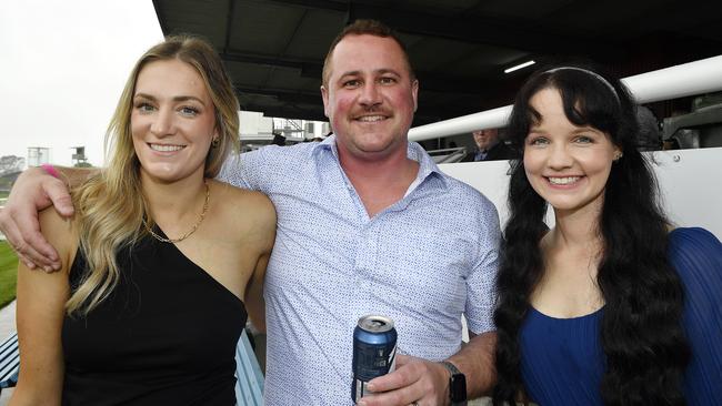 The Ladbrokes 2024 Moe Cup is held at Moe Horse Racing Club, Moe Victoria, Friday 18th October 2024. Racegoers Madi, Jack and Rachel enjoying the races.Picture: Andrew Batsch