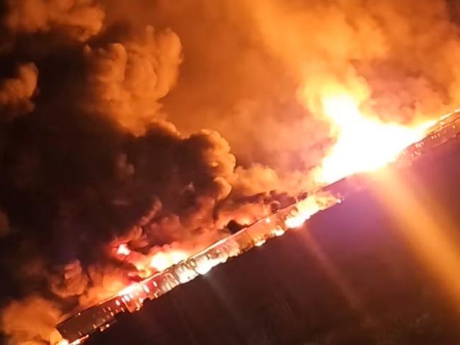 A huge explosion can be seen during a fire at a large industrial shed in Anakie, about 25 minutes from Geelong. Photo: Supplied.