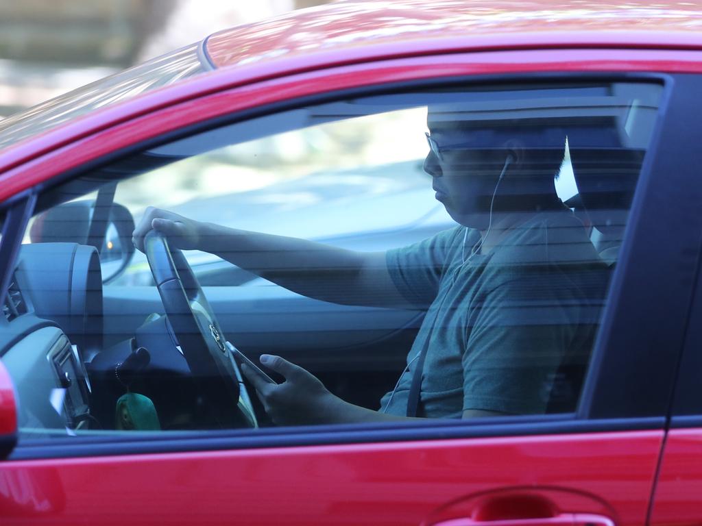 One in 42 drivers were snapped using their mobile phones while driving in a 2020 trial. Picture: John Grainger