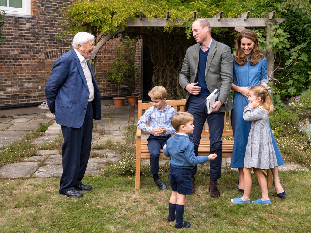 The Duke and Duchess of Cambridge, Prince George, Princess Charlotte and Prince Louis with Sir David Attenborough in the gardens of Kensington Palace in London. Picture: Kensington Palace