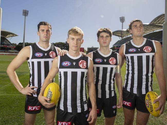 Port Adelaide players playing in the Showdown for the first time in the prison bars at Adelaide Oval after captains run. Josh Sinn, Joe Richards, Christian Moraes and Ollie Lord 8th May 2025 Picture: Brett Hartwig