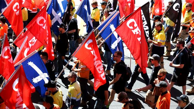 A CFMEU march featuring the Eureka flag. Picture: AAP