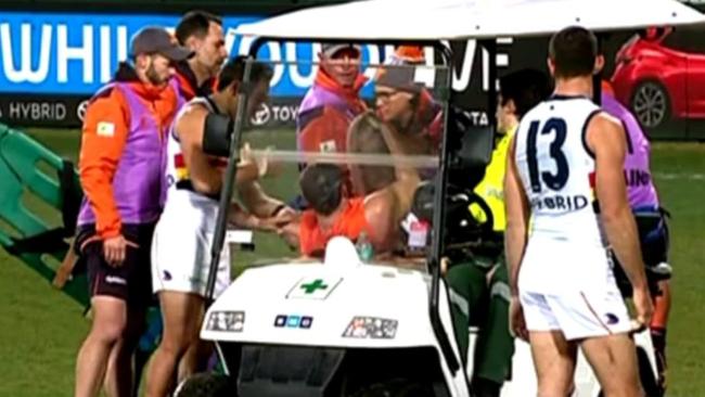 Eddie Betts consoles Heath Shaw on Saturday night.