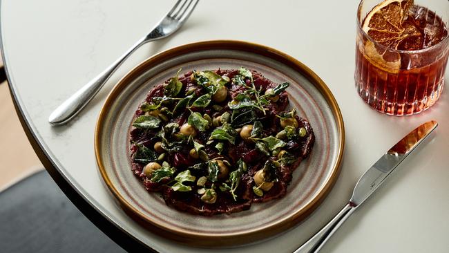 Kangaroo loin, black garlic, pickled grapes at Storehouse Flinders East, Adelaide. Picture: Supplied