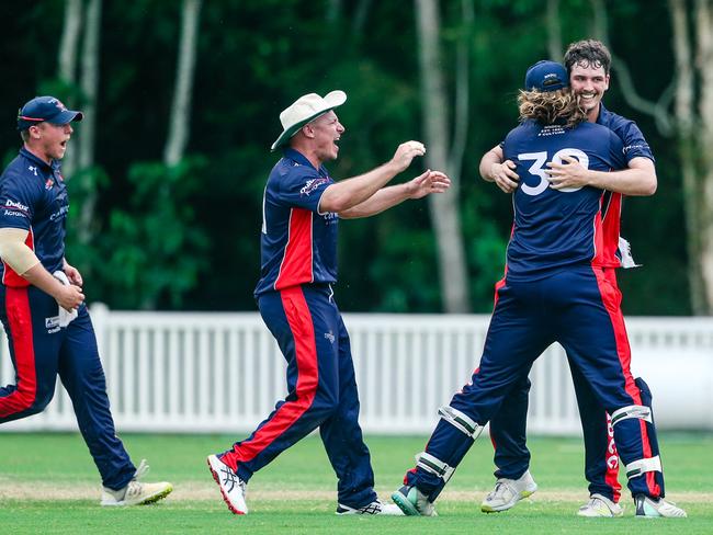 Mudgeeraba players celebrate a wicket in the second grade one day final. Picture: Glenn Campbell