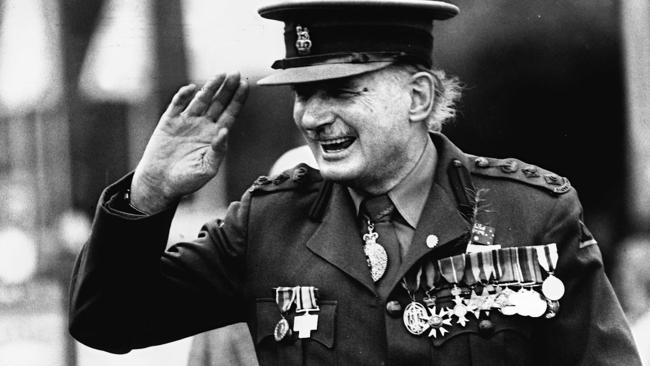 Soldier and surgeon Sir Weary Dunlop salutes the crowd during an Anzac Day march in 1990. Picture: Mark Morrissy.