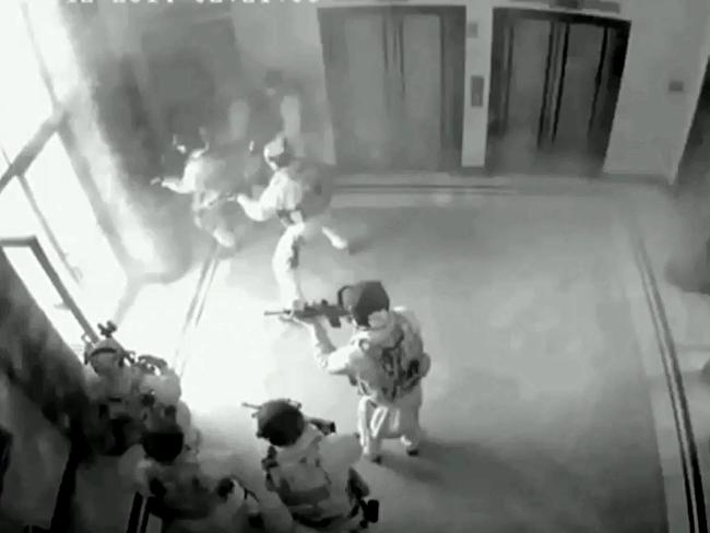 CCTV shows the moment the tactical operations unit storm the Lindt cafe in Martin Place, killing Man Haron Monis.