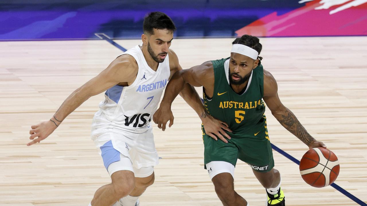 LAS VEGAS, NEVADA - JULY 10: Patty Mills #5 of the Australia Boomers is guarded by Facundo Campazzo #7 of Argentina during an exhibition game at Michelob ULTRA Arena ahead of the Tokyo Olympic Games on July 10, 2021 in Las Vegas, Nevada. (Photo by Ethan Miller/Getty Images)