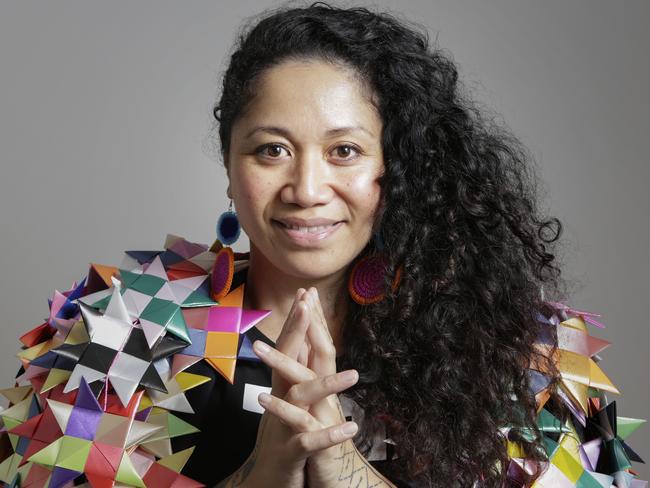 Maryann Talia Pau weaves paper stars together in a symbol of peace to create a more optimistic world without violence. She has the 'One Million Stars' exhibition opening at the end of the month where she's made 1 million stars to be on display. March 7, 2018.  (Photo AAP/ Megan Slade)